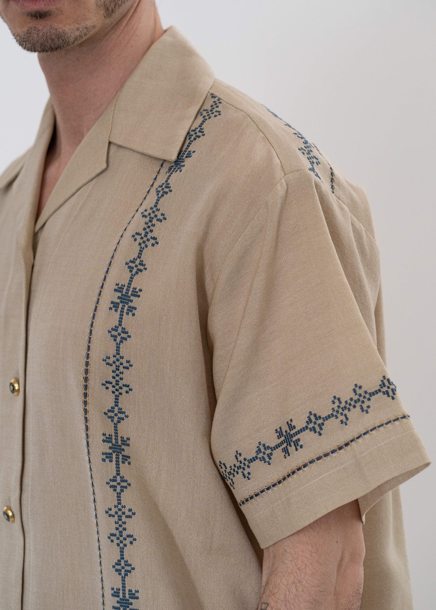The André Shirt Handwoven Sand with Blue Embroidery